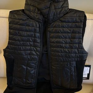 Black vest, never worn, size 14/16 girls, light- mid weight